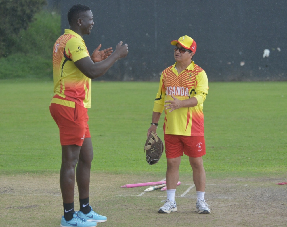 New Uganda coach Abhay Sharma guides a player 